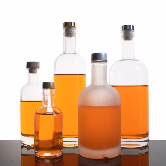 卸売 700 ミリリットル 750 ミリリットル 500 ミリリットルクリアラウンド空ラムウイスキース​​ピリットジンウォッカガラス酒ボトルコルクキャップ